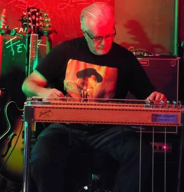 Rick Simmons on Steel Pedal, hence the Breakin Steel name