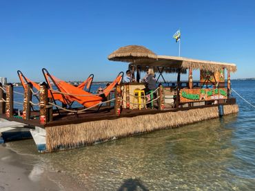 Side view of tiki boat