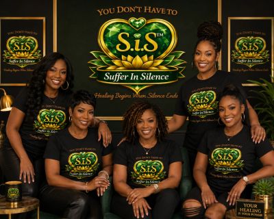 Five women wearing Suffer In Silence shirts pose confidently in front of a S.i.S logo backdrop.