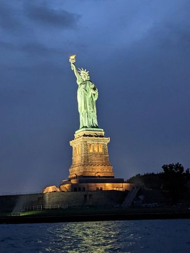 Statue of Liberty at sail under lights