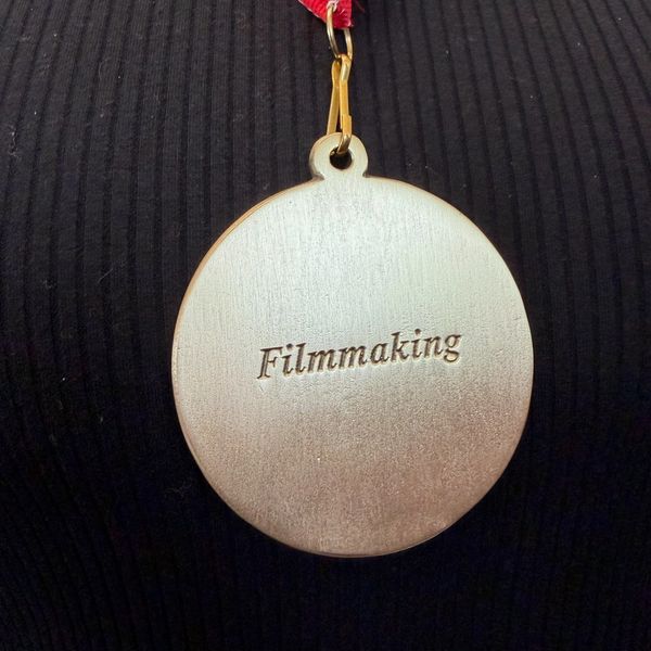 Close-up of a filmmaking medal.