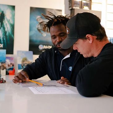 scuba gear, rental snorkeling gear, boat shuttles to the spring, experiences for non-divers