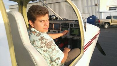 Zachary Lippert at airplane controls