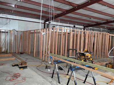 Wooden frame construction inside a building.