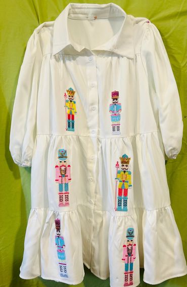 Cotton 3/4 sleeve 3 tier ruffle dress darned with 6 sequined nutcrackers.