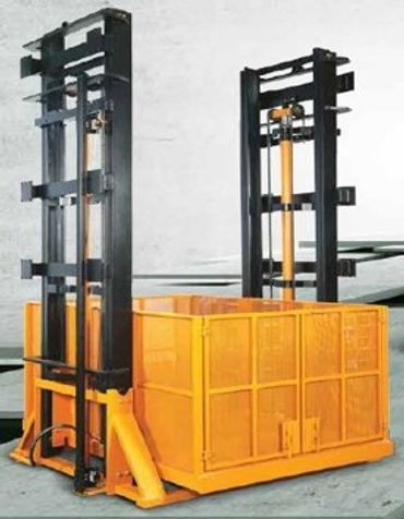 Industrial yellow and black forklift used for lifting heavy loads.