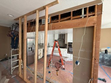 Temporary support framing was installed to support the ceiling while a beam was added to give extra