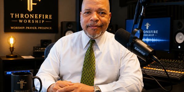 Ferdinand Johnson in a professional worship and podcast studio creating Christ-centered music, worsh