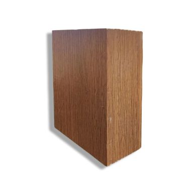 Wooden block with a triangular prism shape.