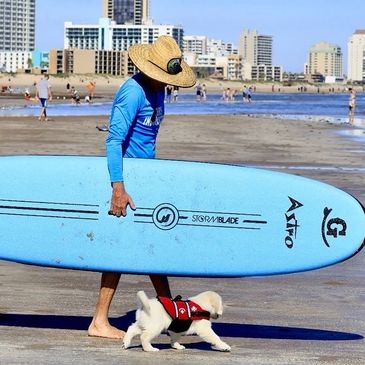 Gene and Astro heading out for his very first surfing lesson!