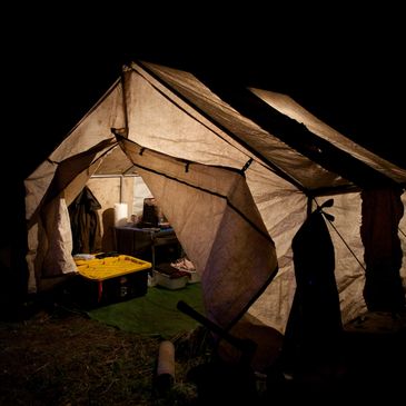canvas wall tent with wood stove. elk hunting tent. rental wall tent. camping tent rental