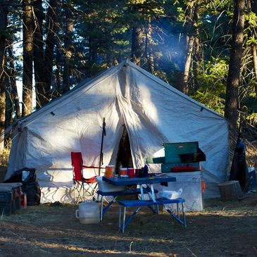 glamping tent. group camping tent rentals. hunting tent. wall tent. rental tents. tent with stove