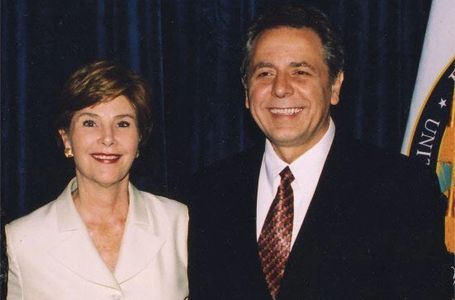 Mr Moskaluk with Laura Bush receiving Presidential Award 2003
