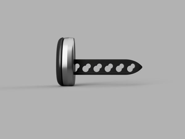 Oval-shaped object with a black, hollow blade and metallic edge on a gray background.