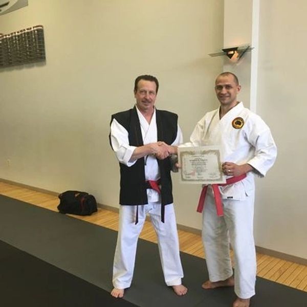 The Robert Torres with Shihan Rick Herbster (Mentor & Instructor from the Rising Sun Karate Academy)