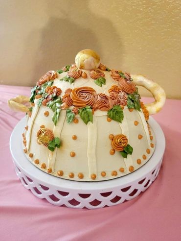 I got creative and made a vintage style Tea Pot cake.