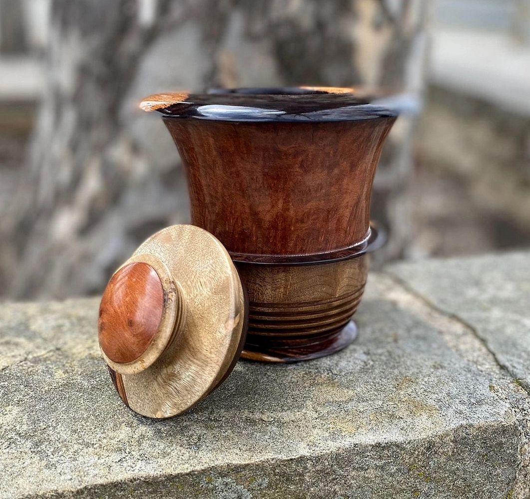 Piece #0921-01 on a ledge outside. Desert Ironwood, old growth Redwood Burl, figured Myrtlewood.