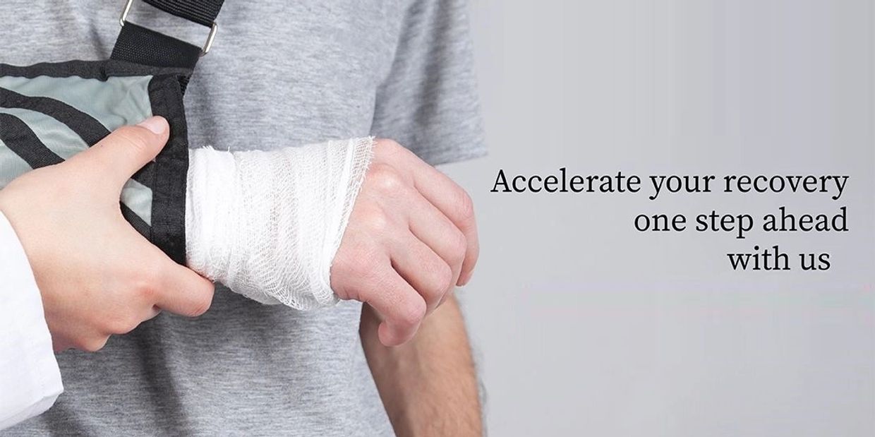 Person with a bandaged wrist supported by another hand, promoting recovery.