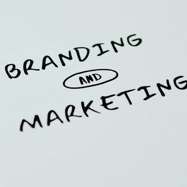 Handwritten note saying “Branding and Marketing”