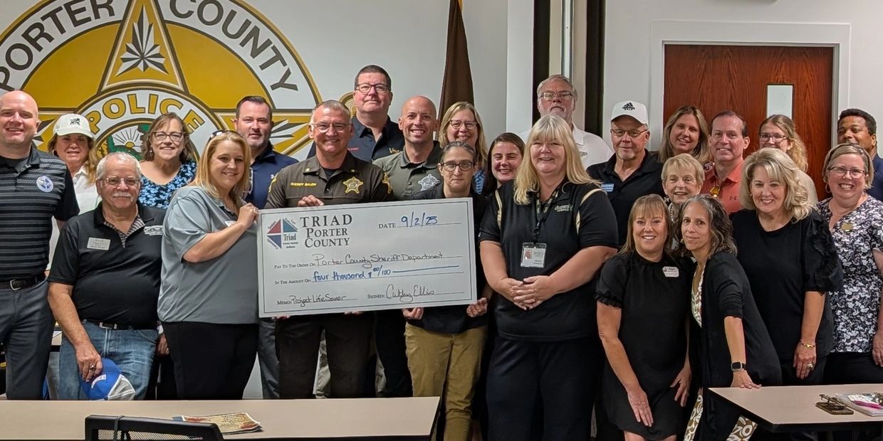 TRIAD members in 2025 presenting a check to Project LifeSaver