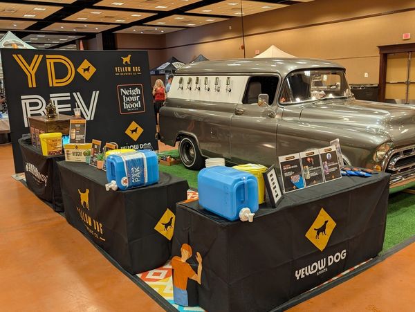 Vintage car turned beer tap station at Yellow Dog Spirits booth.
