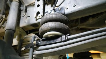 air bag helper spring installation and build kits