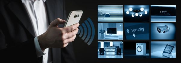 Man controlling smart home devices remotely using a smartphone app.