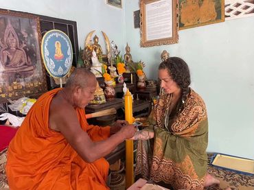 Being blessed by the monk