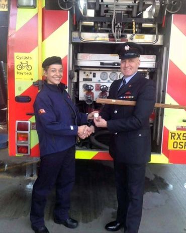 Ceremonial graduation. Recieving my badge for my berry as part of the London Fire brigade.