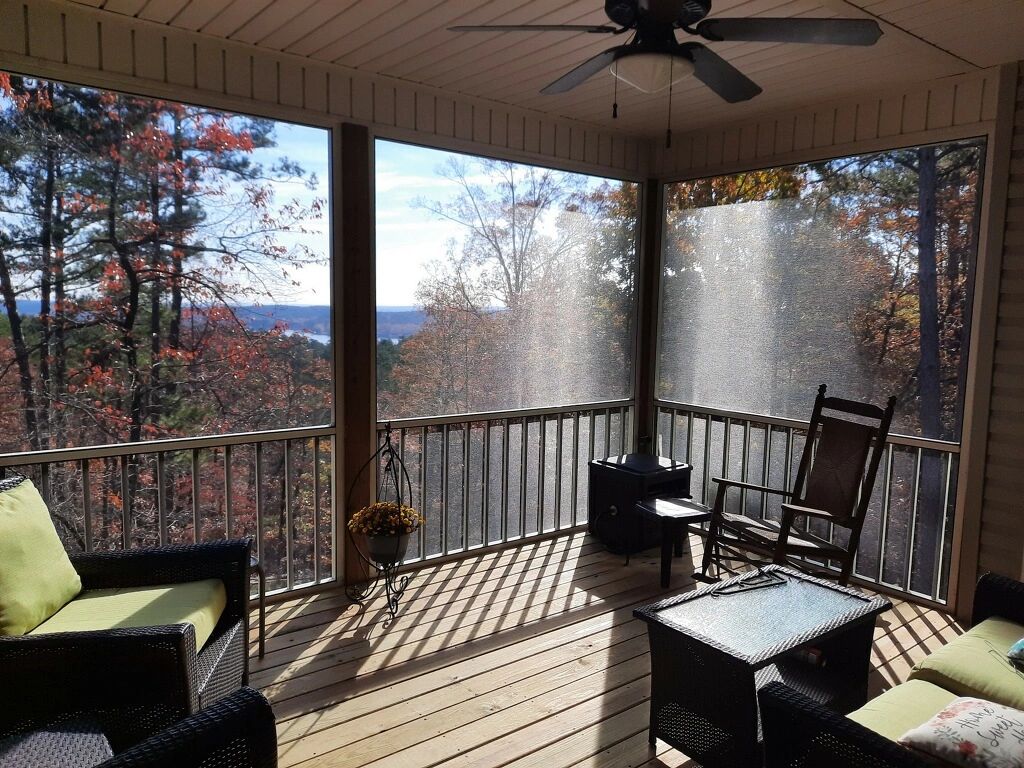 Aluminum framed screen room with aluminum spindles