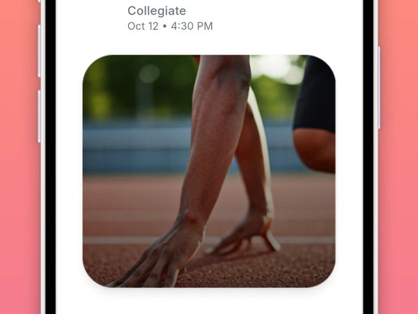 Athlete poised to start a race on a track.