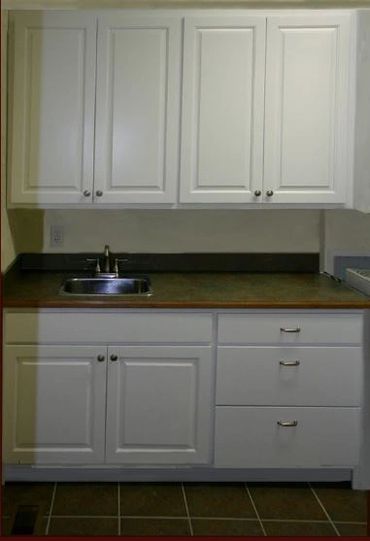 White cabinets above the washing sink