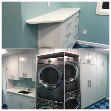 Beautiful laundry room with white cabinets 