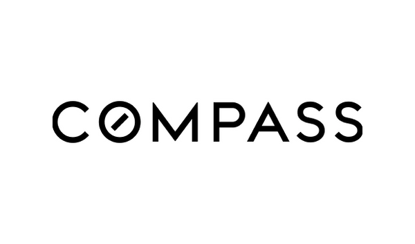Logo of Compass with a stylized compass needle inside the letter O.