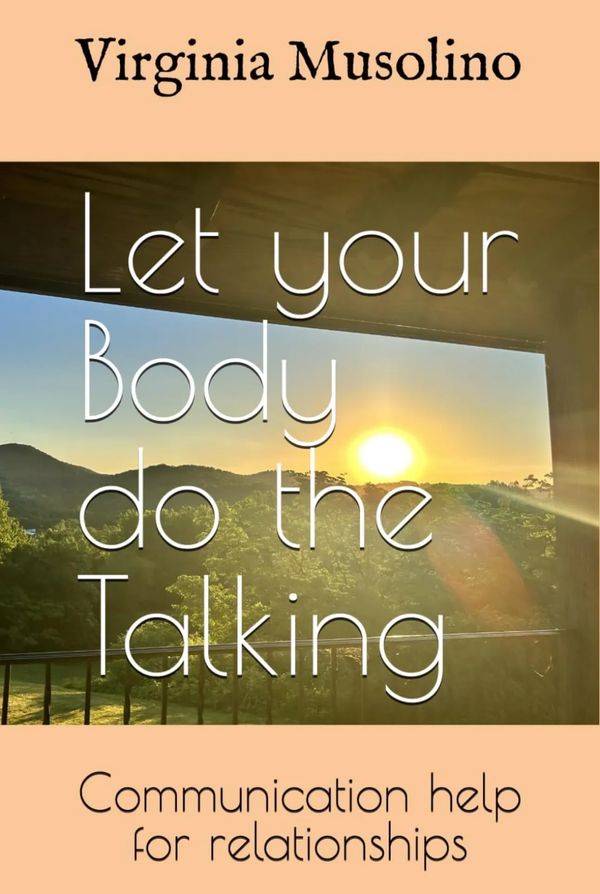 Book cover featuring a sunset and the title about body communication in relationships.