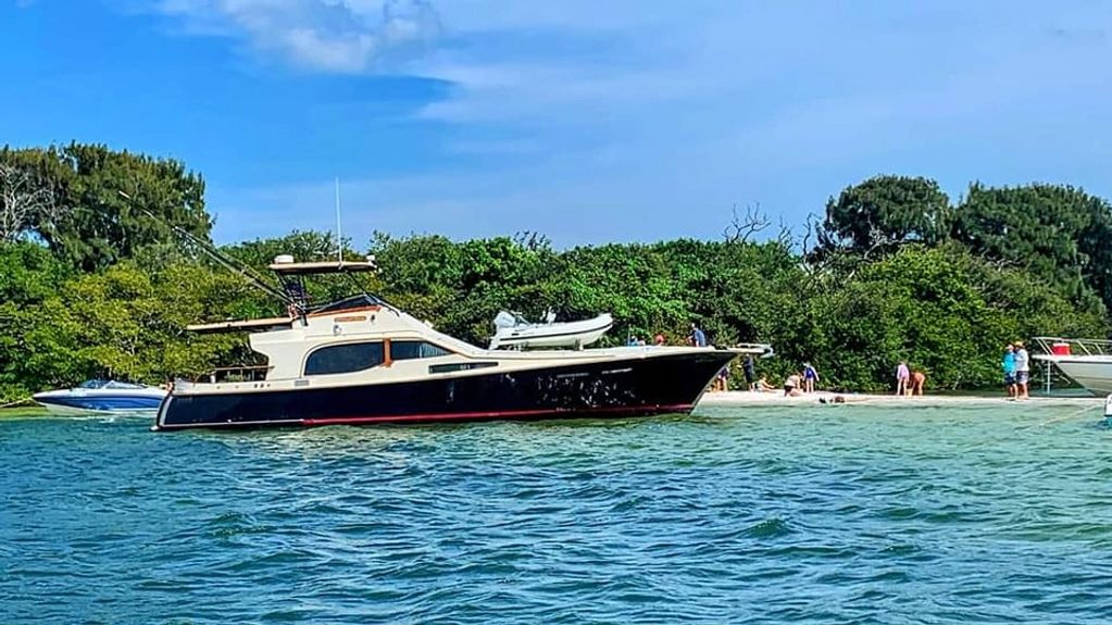 The Midnight Fancy yacht sitting at the Bird Island sandbar. rent this boat next time you are visiti