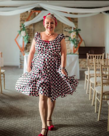 Jen dress in a Hell Bunny 50s style dress in black red and white