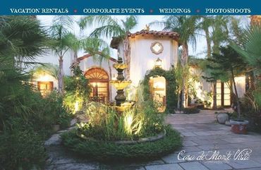 blue, green postcard with Spanish mansion in Palm Springs vacation rental designed by Jill Roberts