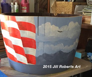 American flag and sky with eagle painted on wood wine barrel. planter. Temecula Murrieta