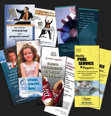 Samples of brochures on black background designed by graphic artist jill Roberts Temecula, CA
