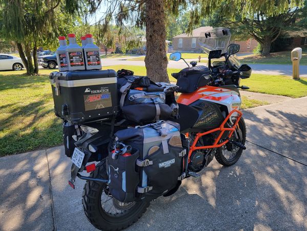 AMSOIL Metric Motorcycle Oil with adventure touring motorcycle.
