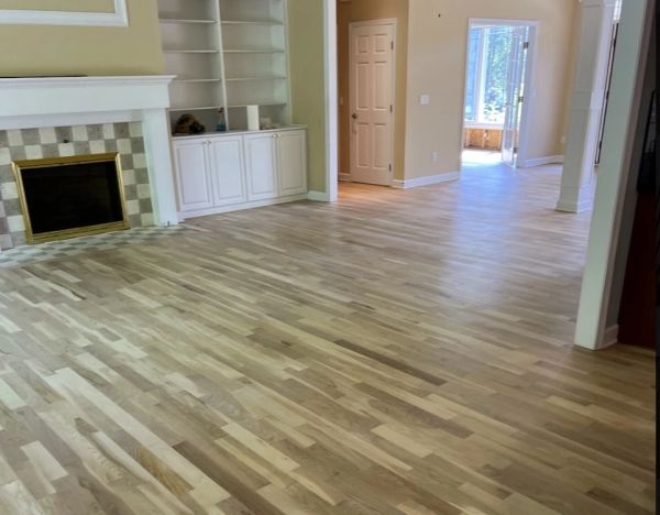 Refinished hardwood flooring in a Broadview Heights, Ohio home.