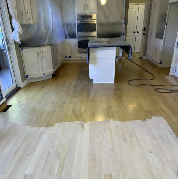 Dust-controlled hardwood floor sanding and plastic sheeting in Solon, OH