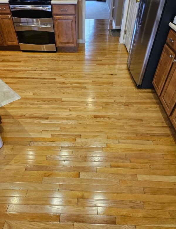 Refinished hardwood flooring in the kitchen of a Rocky River, Ohio home.