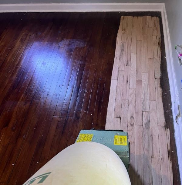 Sanding original oak hardwood down to bare wood in Broadview Heights.