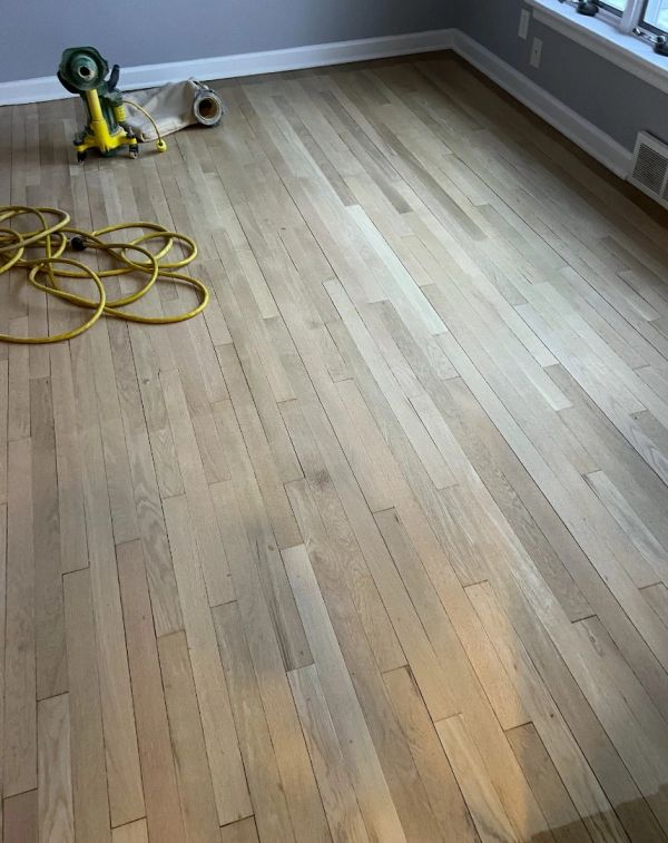 Hardwood floor sanding during a Brecksville refinishing project