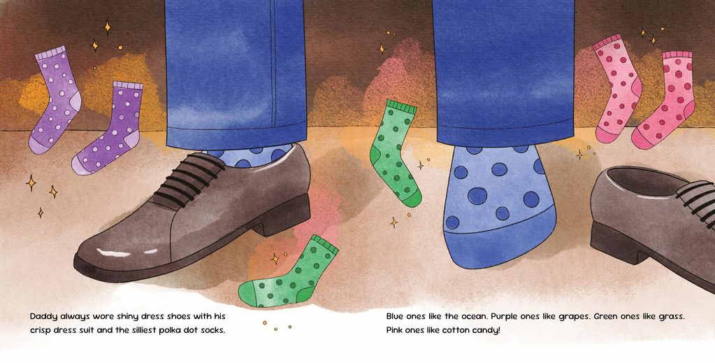 Colorful polka dot socks and shiny dress shoes with blue pants.