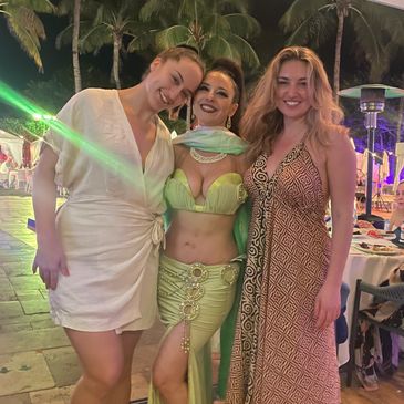 Bridal party picture with Greek bride, bellydancer, and bridesmaid.