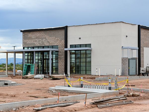 Commercial site work being developed outside a building.