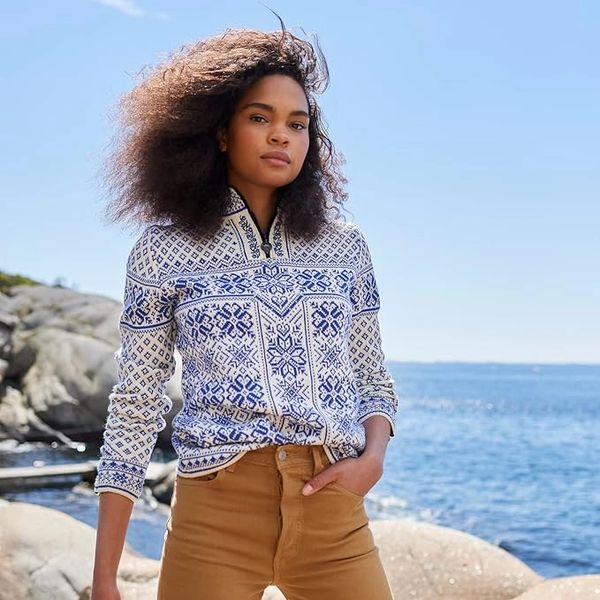 Beautiful girl wearing a Norwegian sweater from Dale of Norway